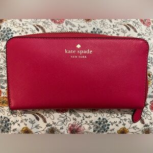 Kate Spade Large continental zip around Wallet in Pink Ruby